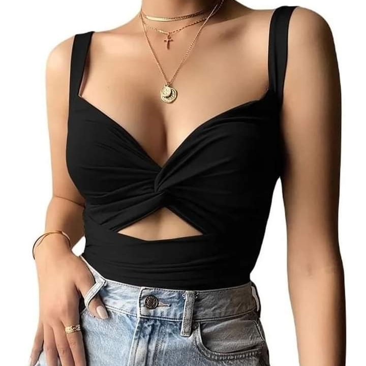 Strappy blouse with neckline and opening in the abdomen